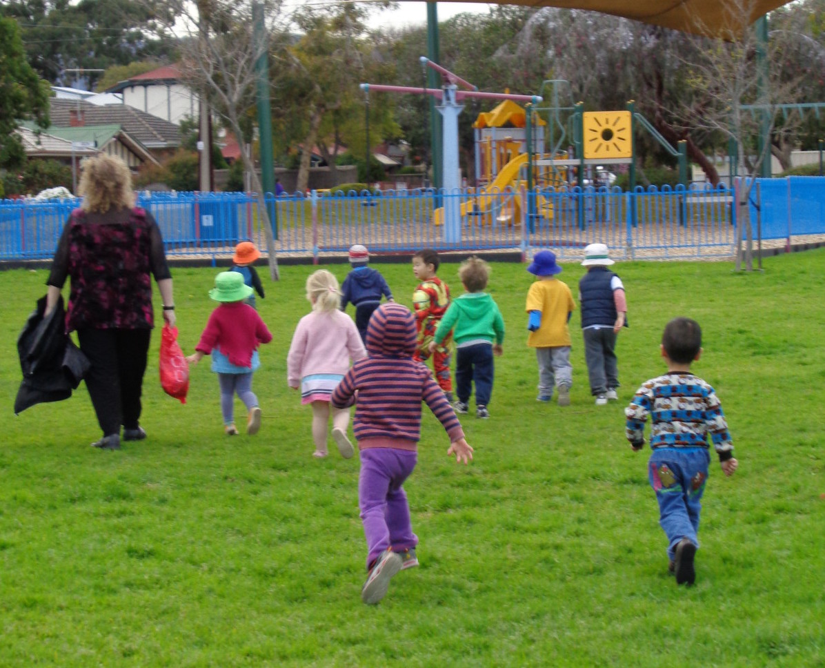 Children visiting the community playground in St Morris Reserve