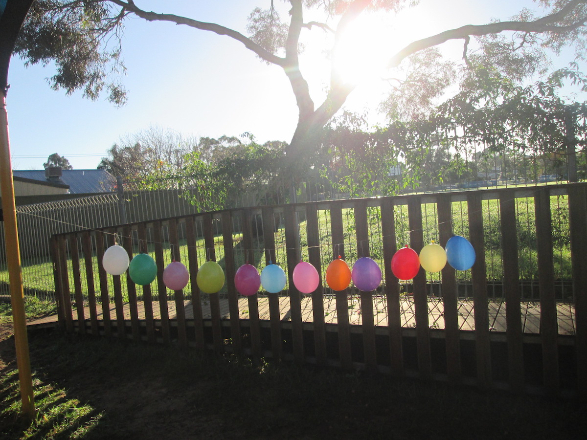 Balloons in the babies room play yard