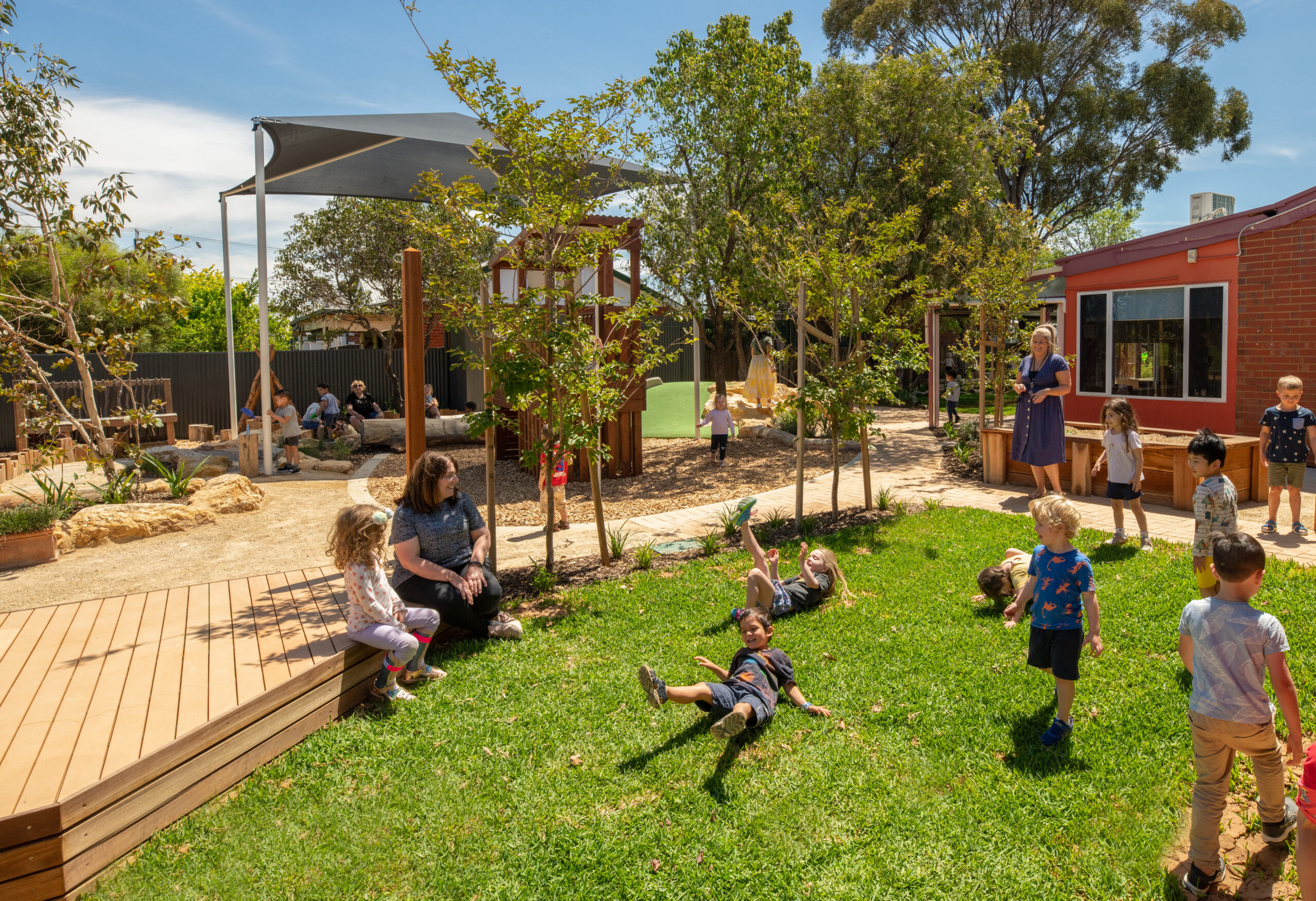 Children playing outside at St Morris Community Child Care Centre – Kindy yard